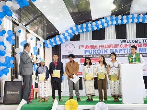Receiving Certificate of Embracing by Rev. Kingkong Painchey 